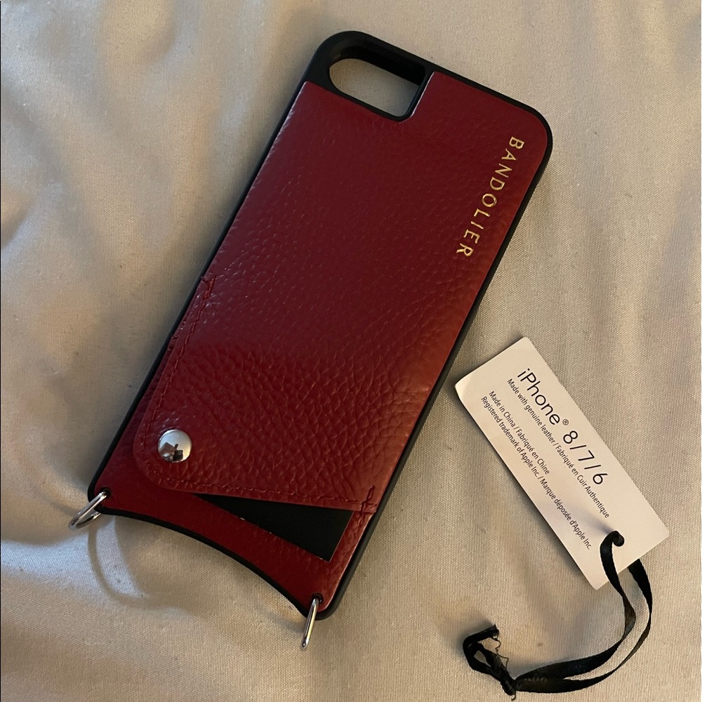 Gently used Bandolier phone case for iPhone 6,7 and/or 8.